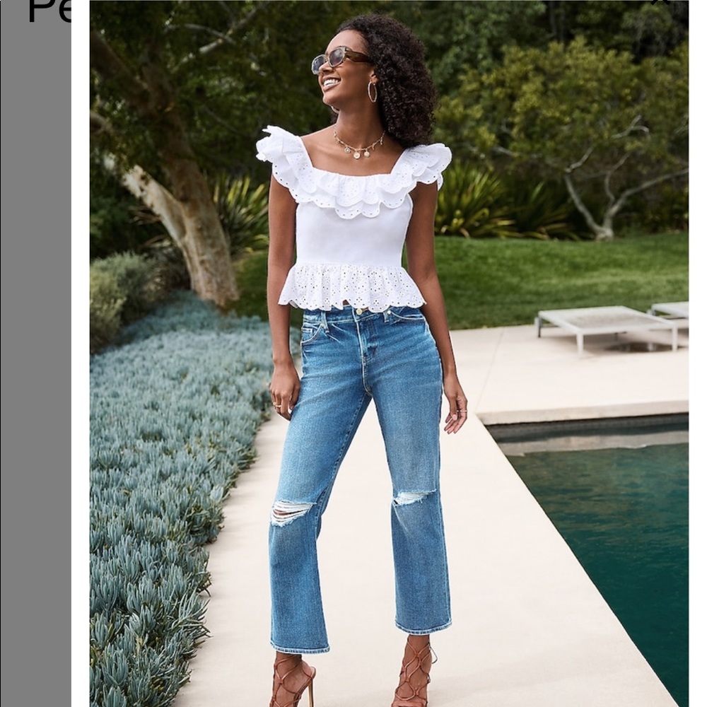 Express open back peplum top with eyelet detail